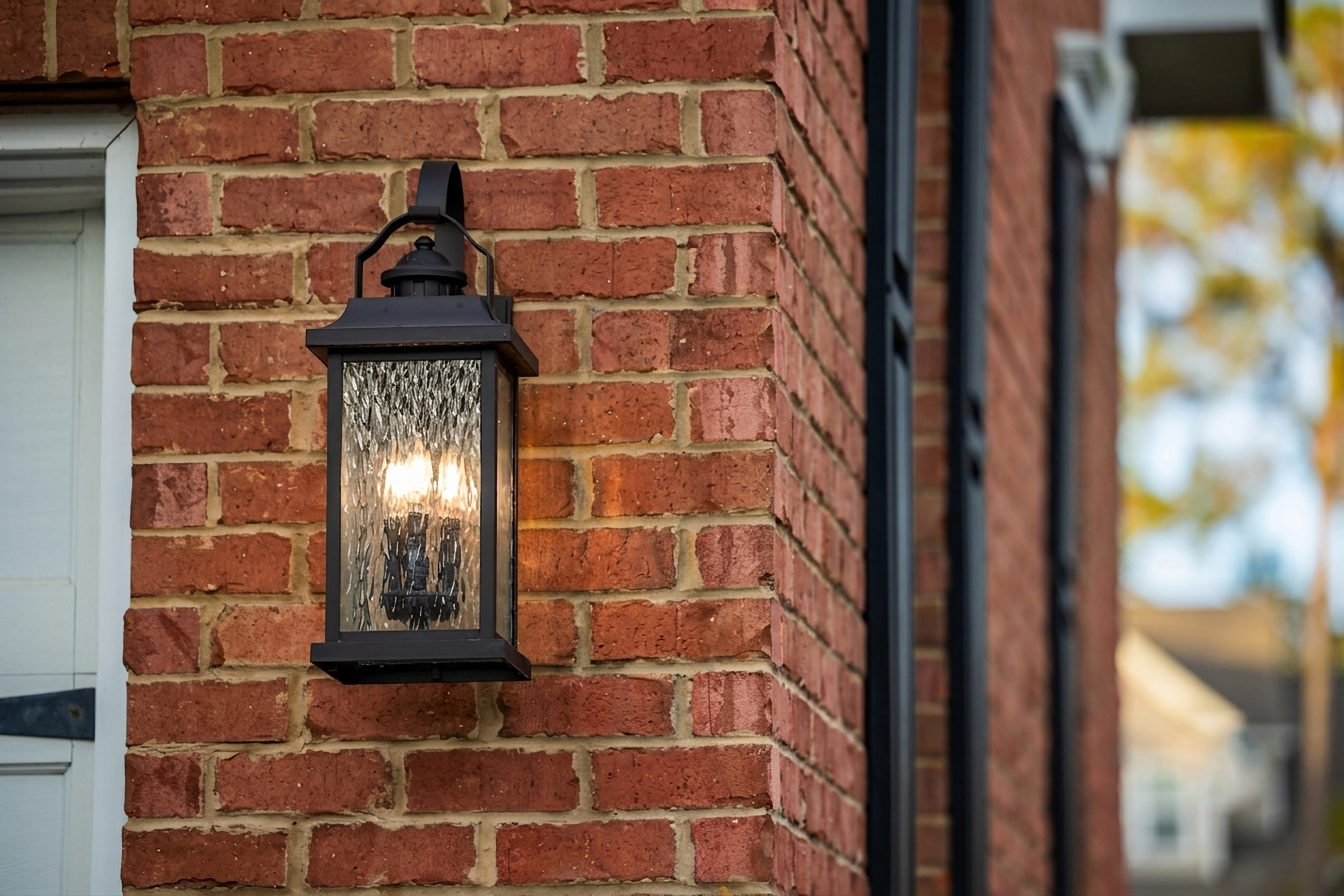 Traditional lantern on a brick facade